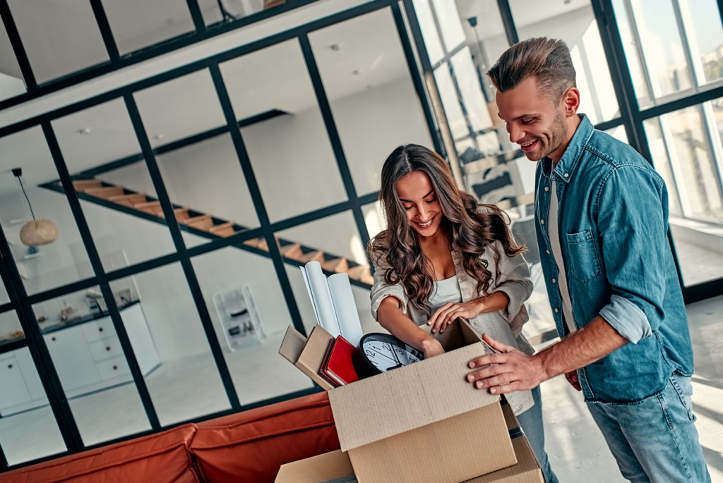 A couple setting up a short-term rental in New York City.