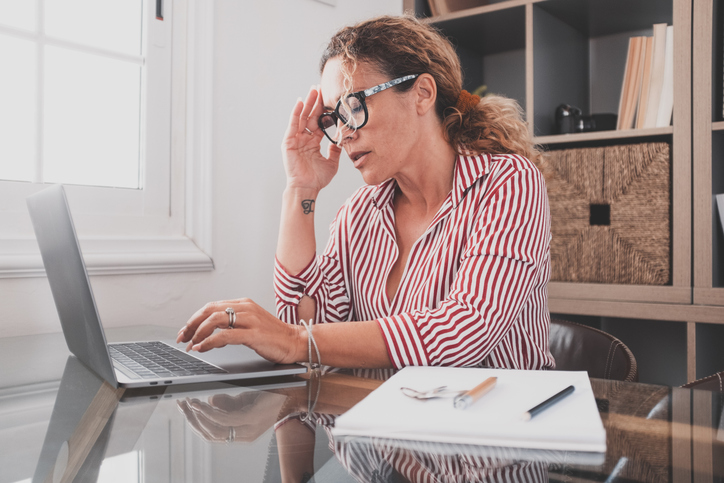 A woman researching whether she should get life insurance.