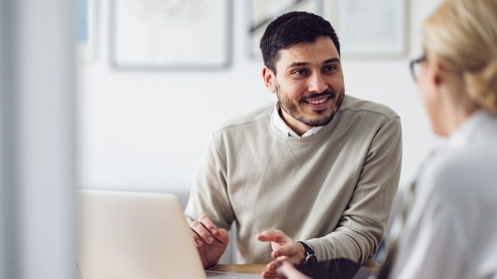 A financial advisor meets with a potential client who's interested in investing more. 