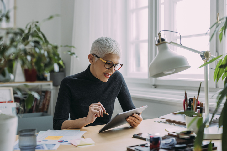 A financial advisor rebalancing the investment portfolio of a client.