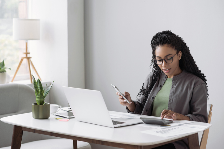 A woman using a virtual options trading platform.