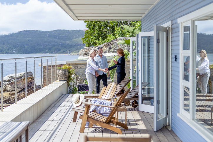 High-net-worth clients touring a luxury property.