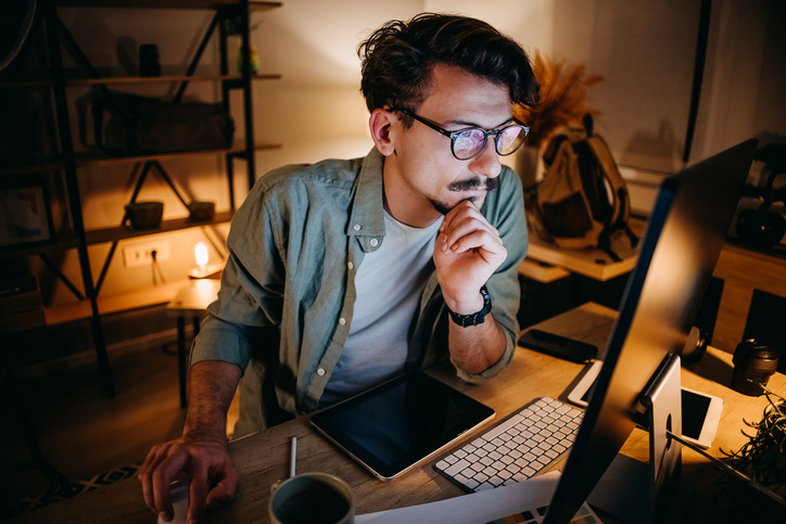 A man reviewing his financial portfolio.