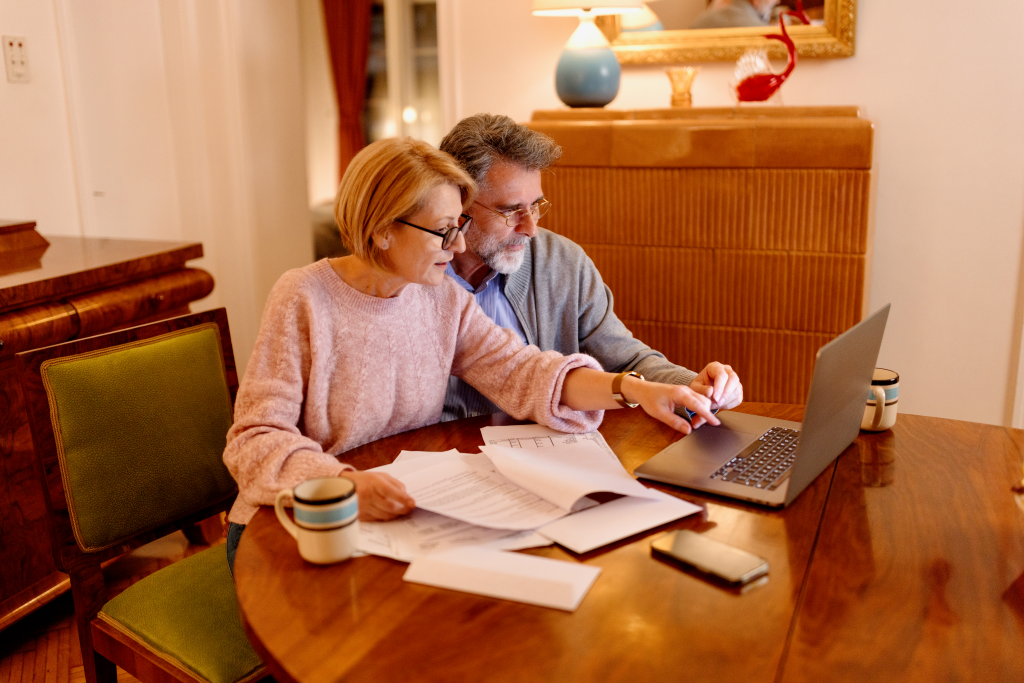 A couple using advice from a financial therapist to make money decisions.