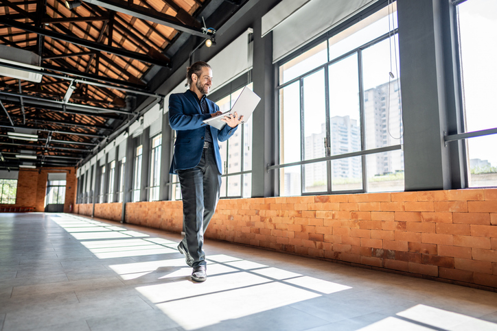 A commercial investor touring an investment property.