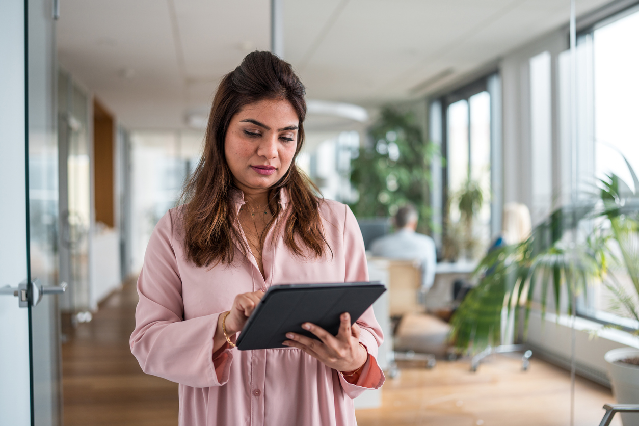 A real estate investor looking up loans to finance a rental property.