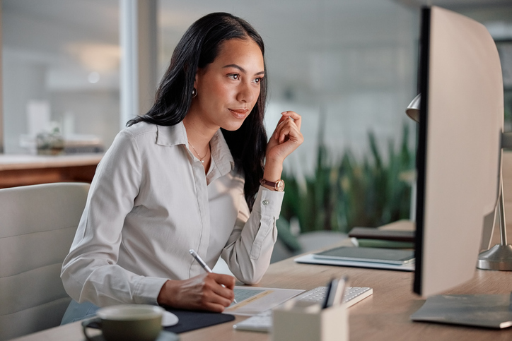 A woman looking up financial planning strategies.