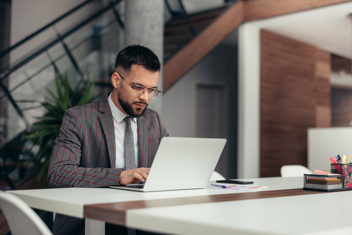 An investor looking up what fee simple means in real estate.