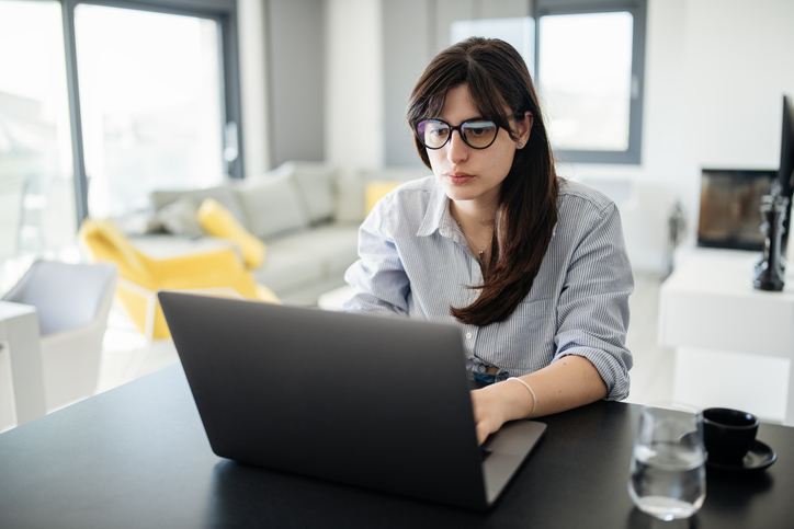 An investor reviewing her investment portfolio.