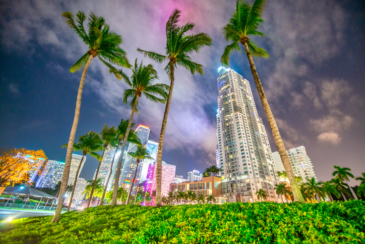 Downtown Miami buildings and skyscrapers at night in Florida.