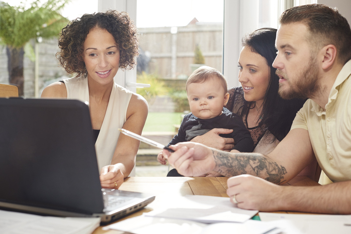 A family in Florida meeting with a financial advisor to discuss a limited guardianship.