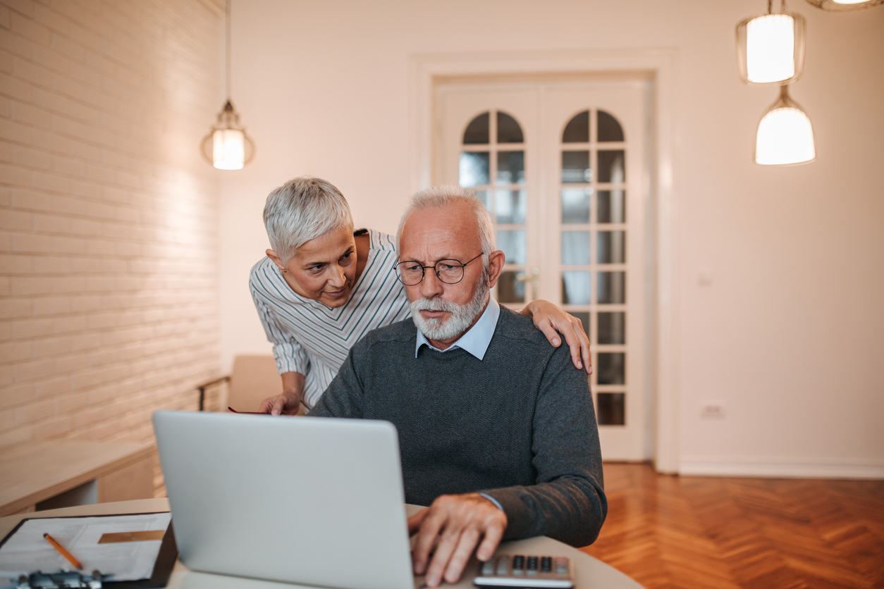 A senior couple in Illinois looking up the requirements for a limited guardianship.