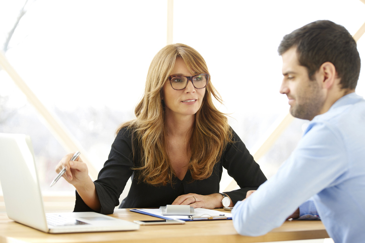 A client reviewing tax-managed mutual funds with a financial advisor.