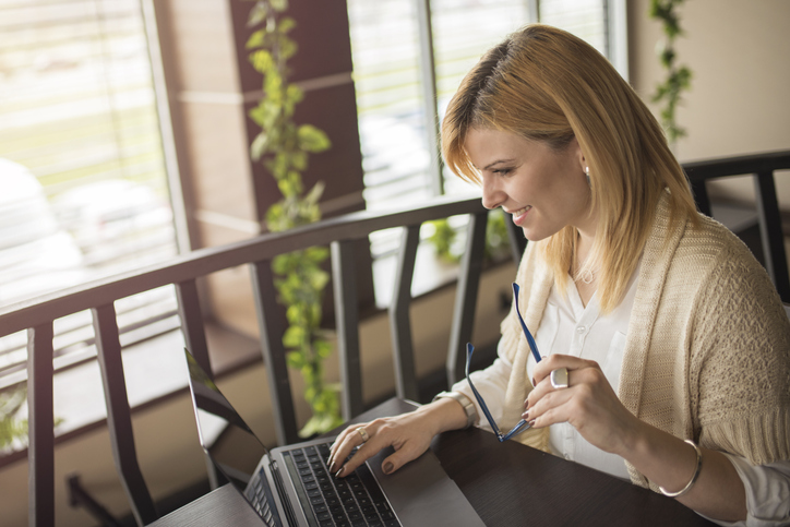 A woman reviewing her application for a second mortgage.