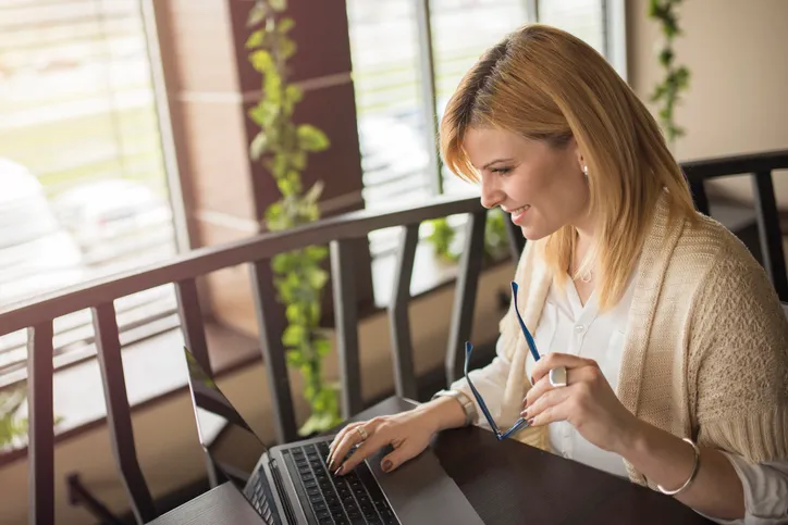A woman reviewing her application for a second mortgage.