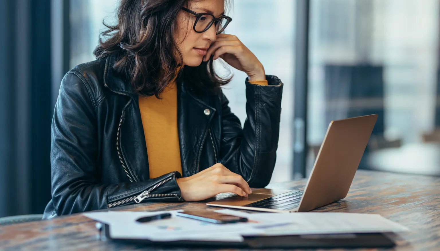 An investor reviewing her real estate portfolio.