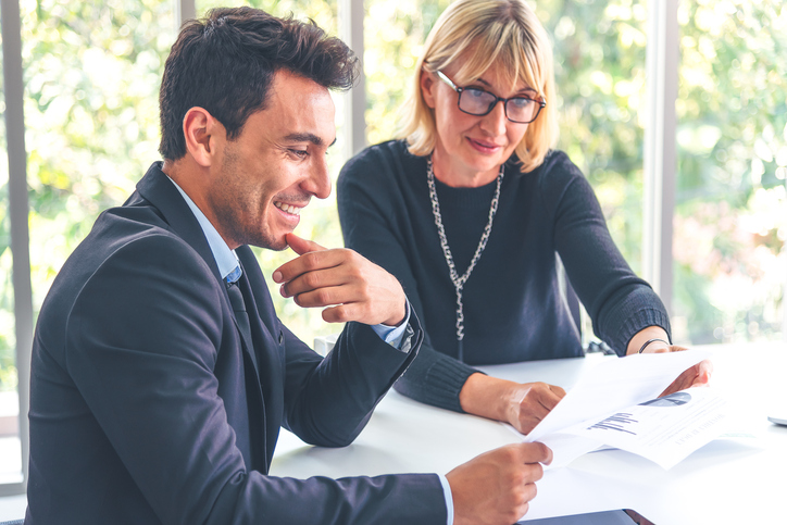 A client and financial advisor comparing an LIRP with an IUL.