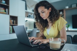 A woman reviewing her investment portfolio.