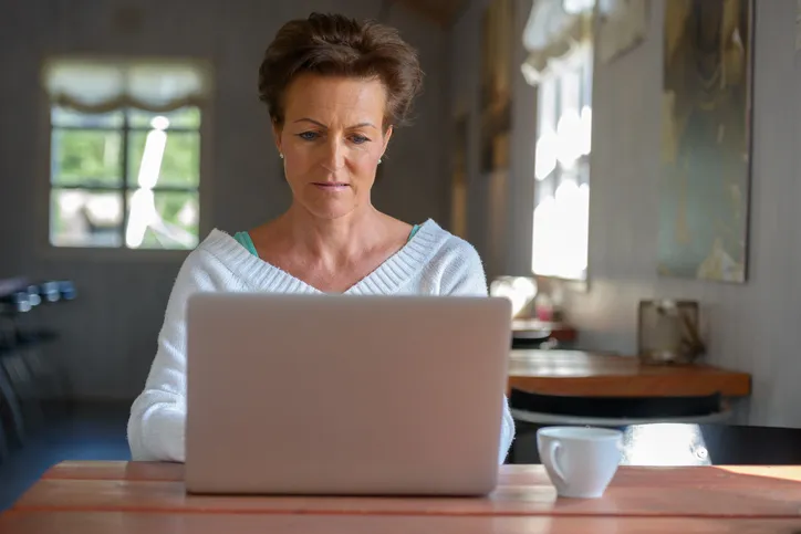 A woman looking up the downsides of using life insurance for retirement.