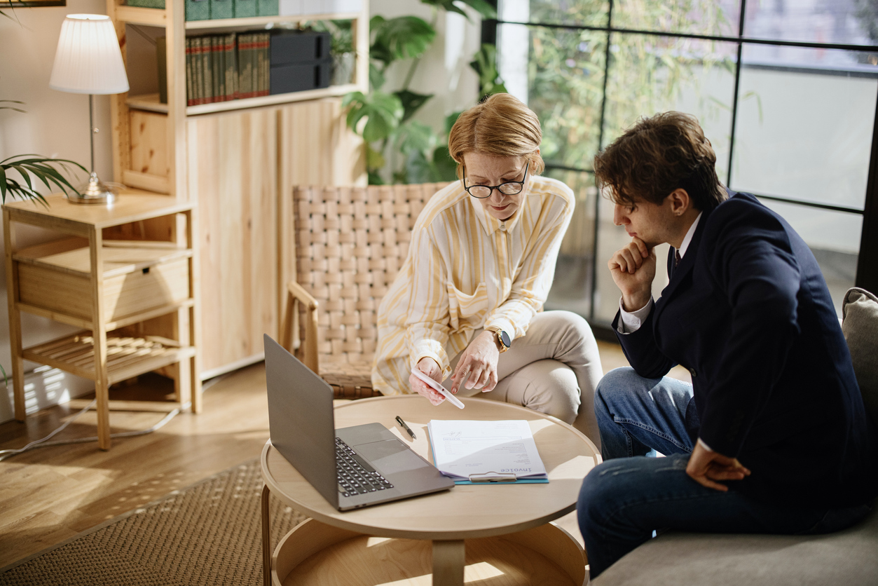 A real estate investor creating an estate plan with her son.