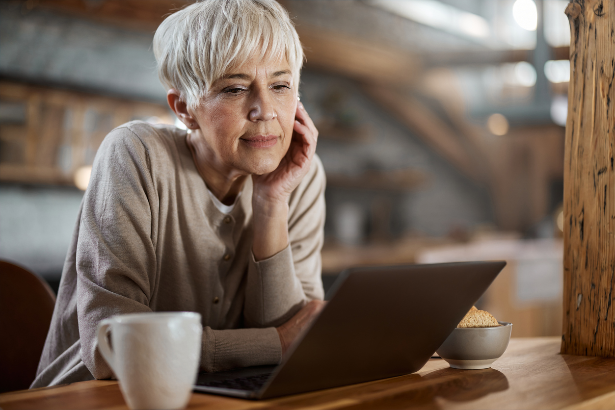 A senior looking up information about spousal survivor benefits.