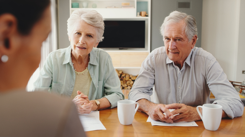A senior couple creating an estate plan to avoid probate for their beneficiaries.