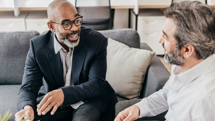 A financial advisor meets with a prospective client. 