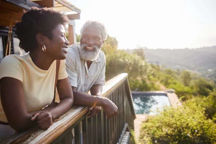 A father and daughter enjoying a vacation at an Airbnb.