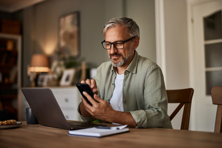 A man looking up examples of fixed-income relative value investing strategies.