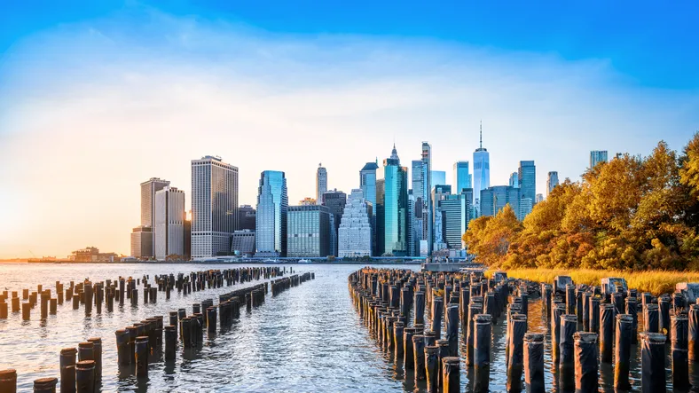 The skyline of lower Manhattan in New York during sunset.

