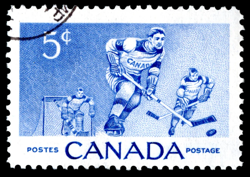 Canada postage stamp showing ice hockey players.