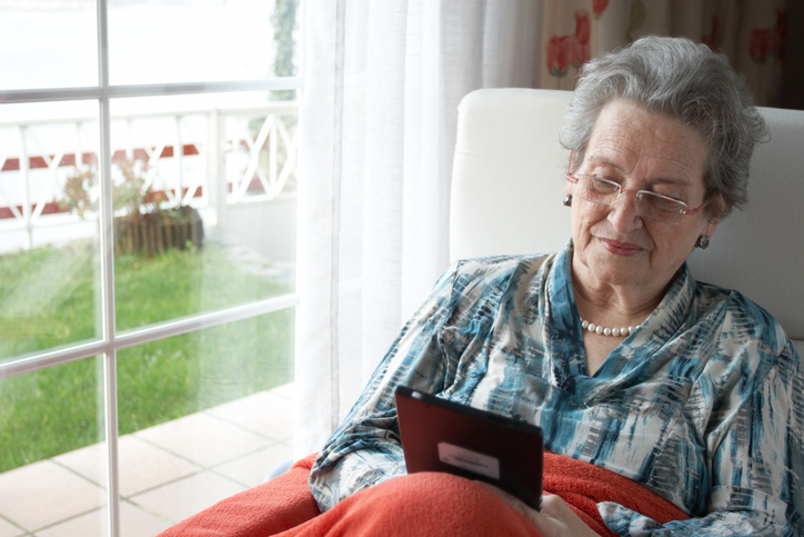 A senior reviewing her retirement plan.