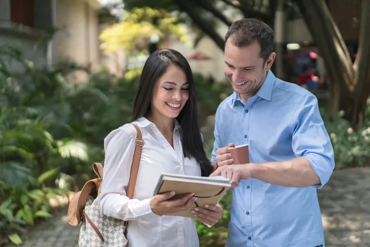 Real estate investors reviewing an investment property.