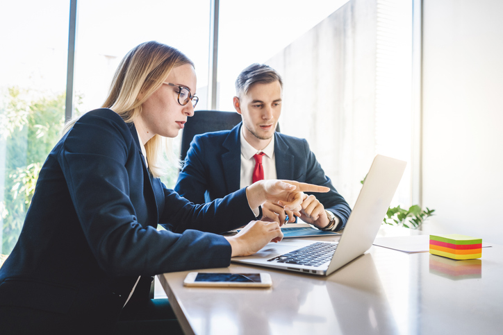 Investors reviewing an investment portfolio.