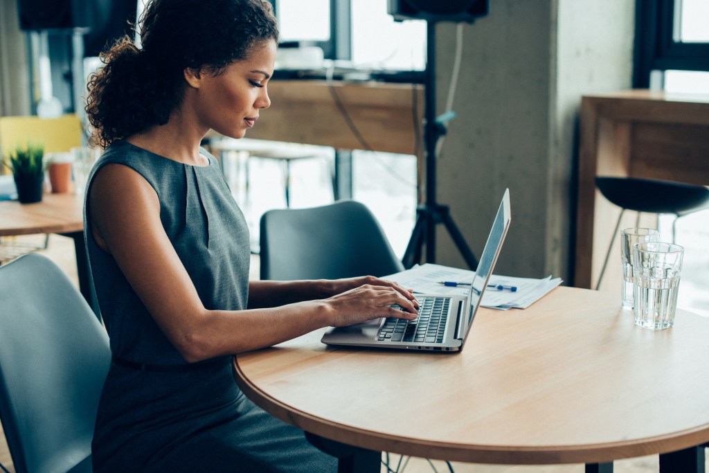 A woman reviewing her investment portfolio.