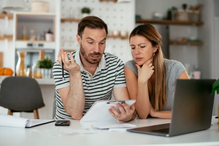 A couple making changes to their investment portfolio.