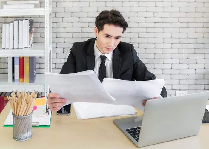 A taxpayer reviewing tax documents.