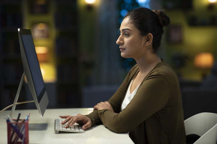 An investor evaluating different investments to rebalance her portfolio.