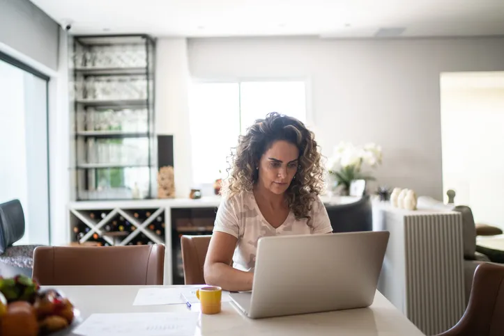 An investor reviewing her investment portfolio.