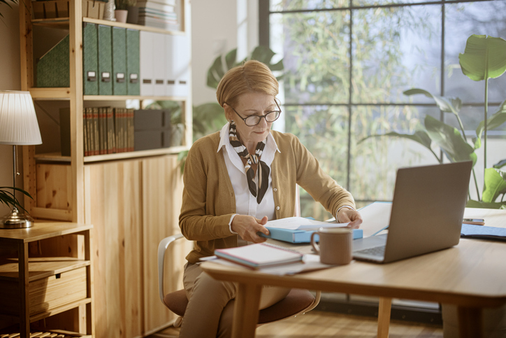 A woman reviewing her investment portfolio.