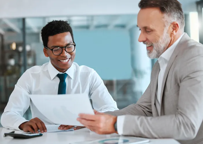 A financial advisor reviewing a portfolio with a client.