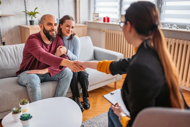 A landlord reaching an agreement with tenants.