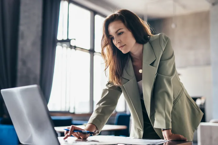 An investor reviewing her real estate portfolio.