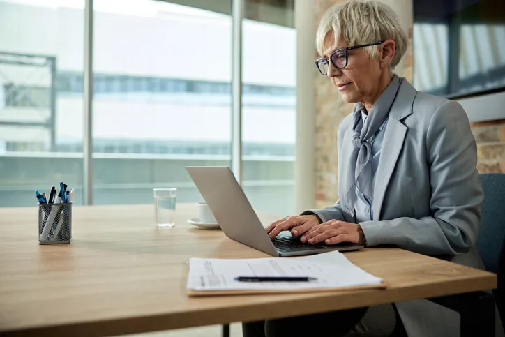 A business woman reviewing her estate plan.