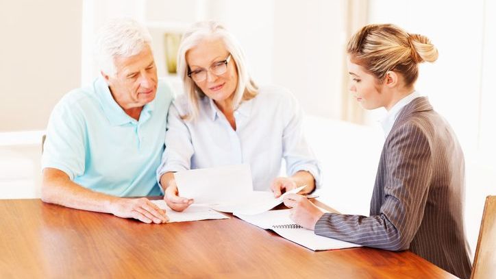 A couple creates a codicil with the help of their estate planning attorney.