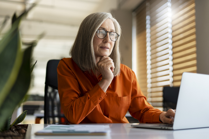 A woman reviewing her HSA plan.