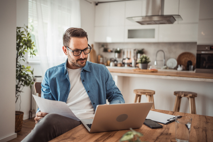 A man looking up qualified expenses for an HSA.