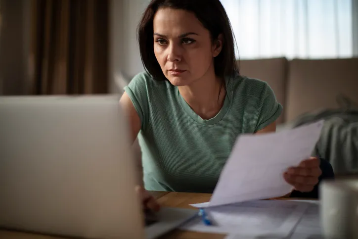 An investor reviewing her portfolio.