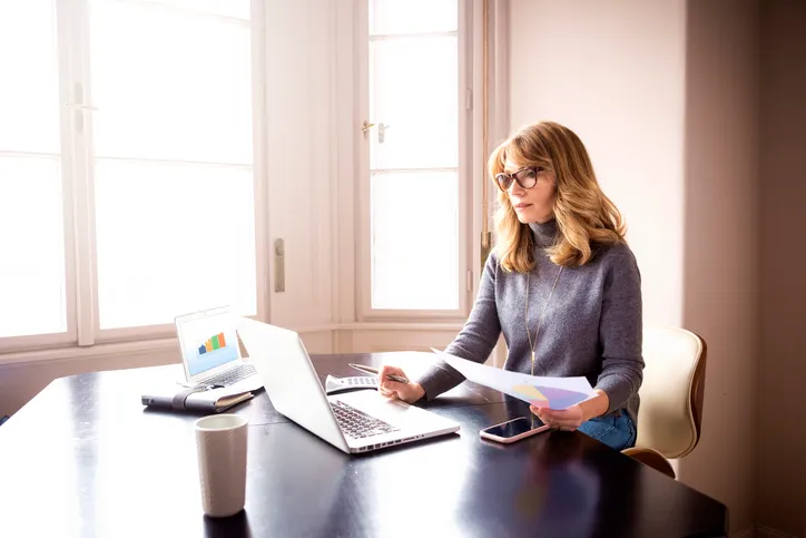 An investor reviewing her portfolio.