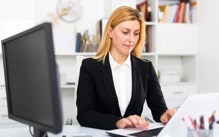 An investor reviewing her portfolio.